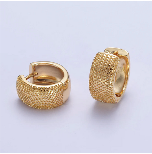 Explore our 24K Gold Filled Wide Textured Dotted Huggie earrings at miaava.com!